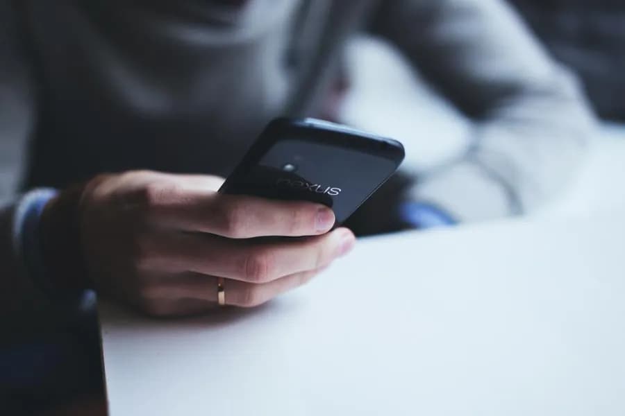 A smartphone held in both hands
