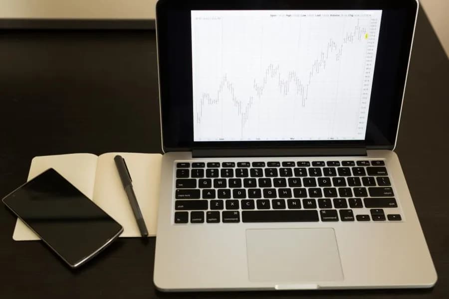 A line chart on a laptop screen