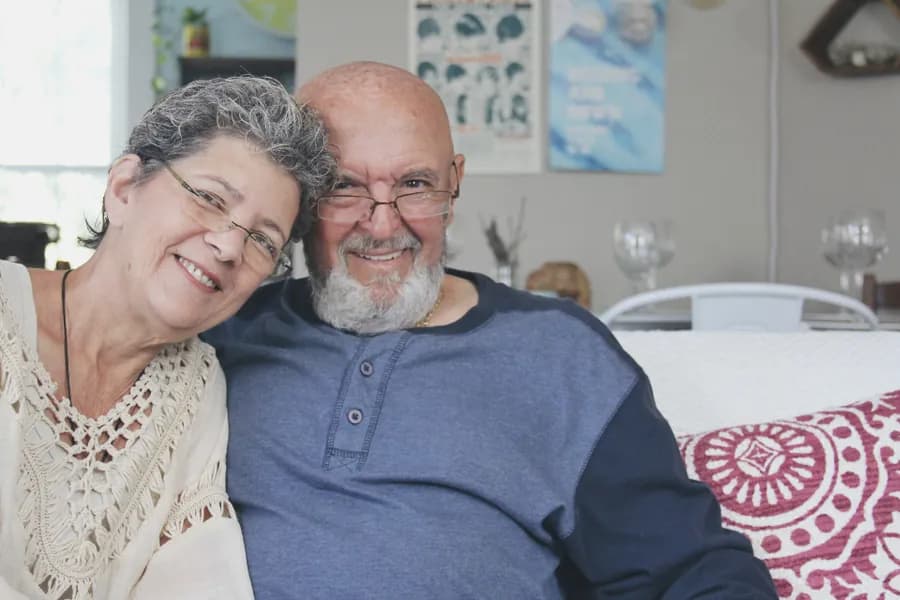 A portrait of an older couple at home