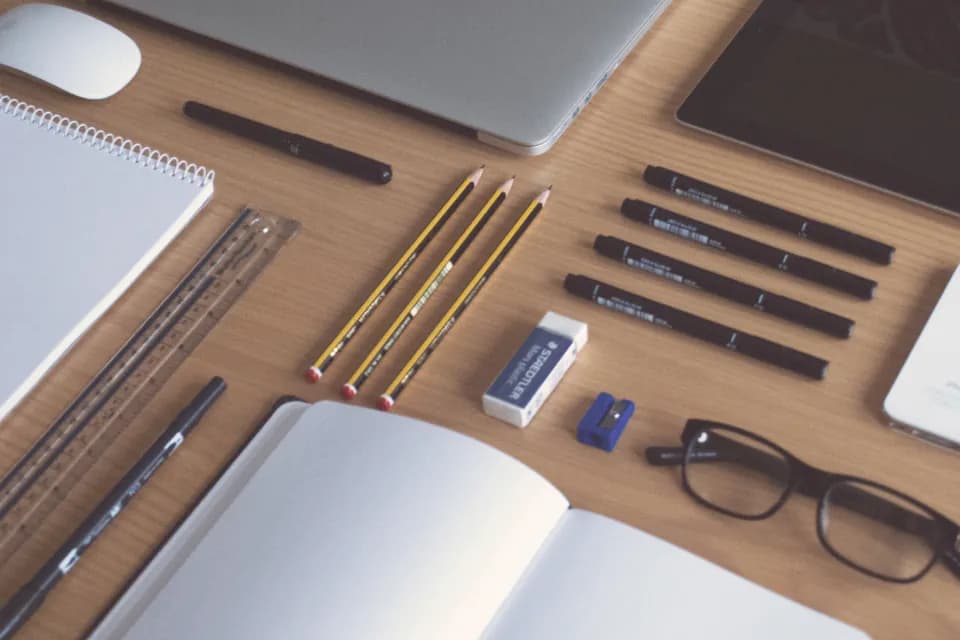 Stationery arranged on a desk