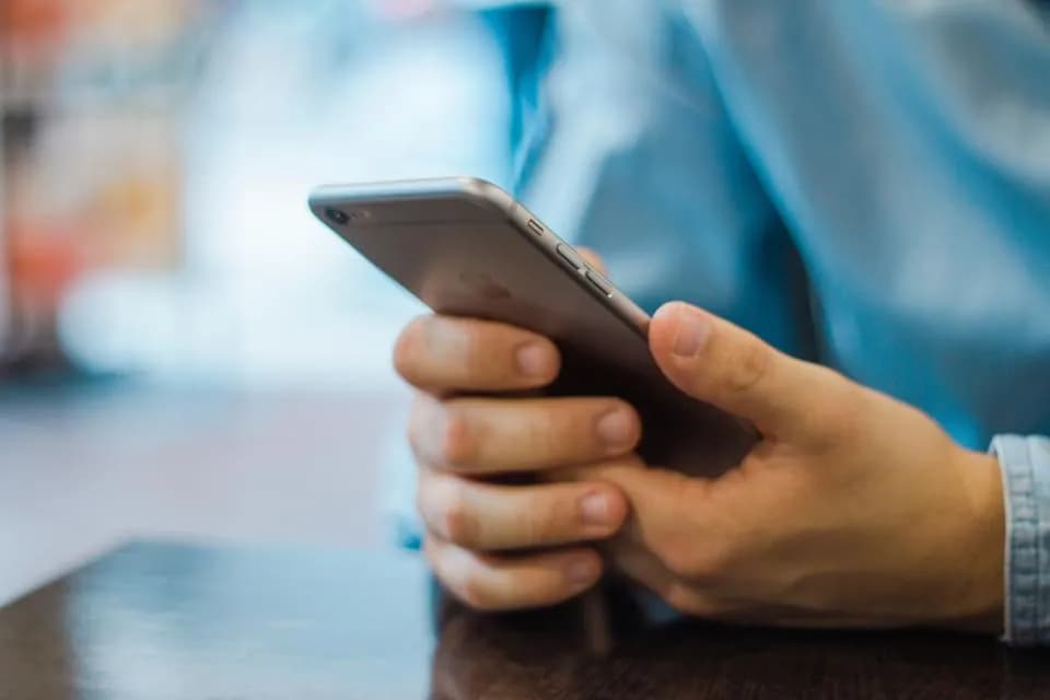 A phone held in two hands