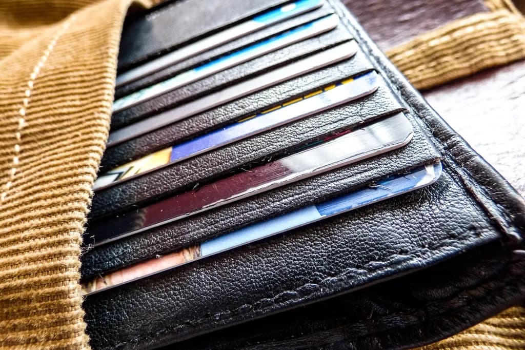 Cards held in the slots of a wallet