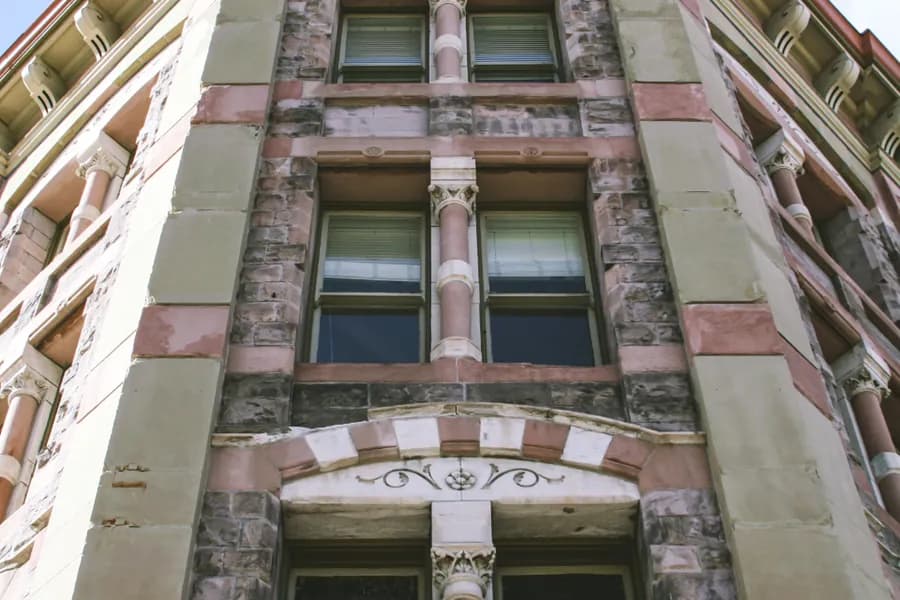 The facade of an older apartment building
